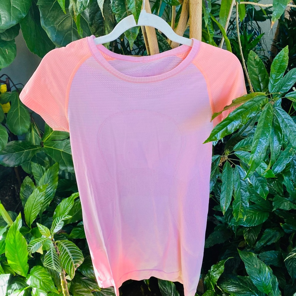 Pink Lululemon workout shirt